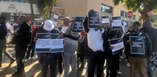 Health Standards Compliance staff picket against relocation